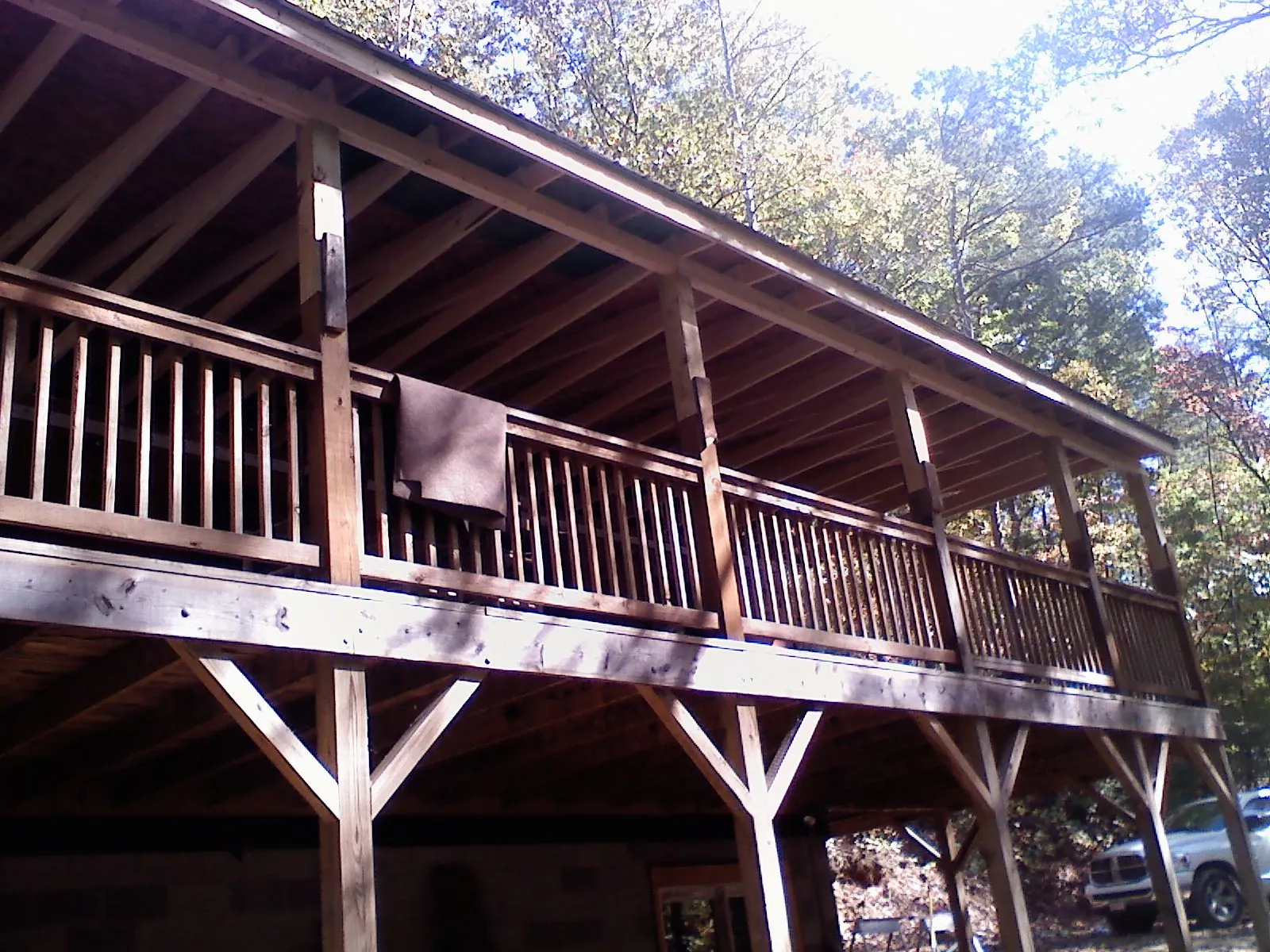 Timber framing under a new elevated porch and deck — Roof Leak Repair in Mascoutah by Roofing Brothers